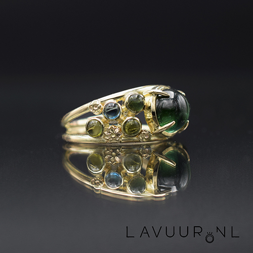 gouden ring met toermalijnen en topaas